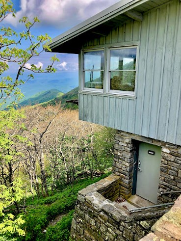 Side view of Craggy Visitor Center and steps leading down to restroom