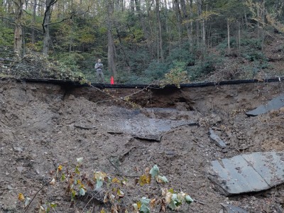 A collapsed section of road on the Blue Ridge Parkway after Hurricane Helene.